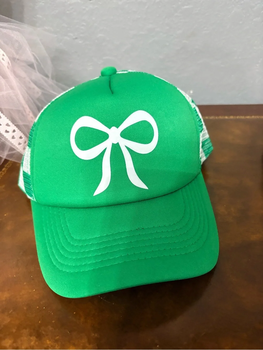 NWT Green Trucker Hat with White Bow Graphic